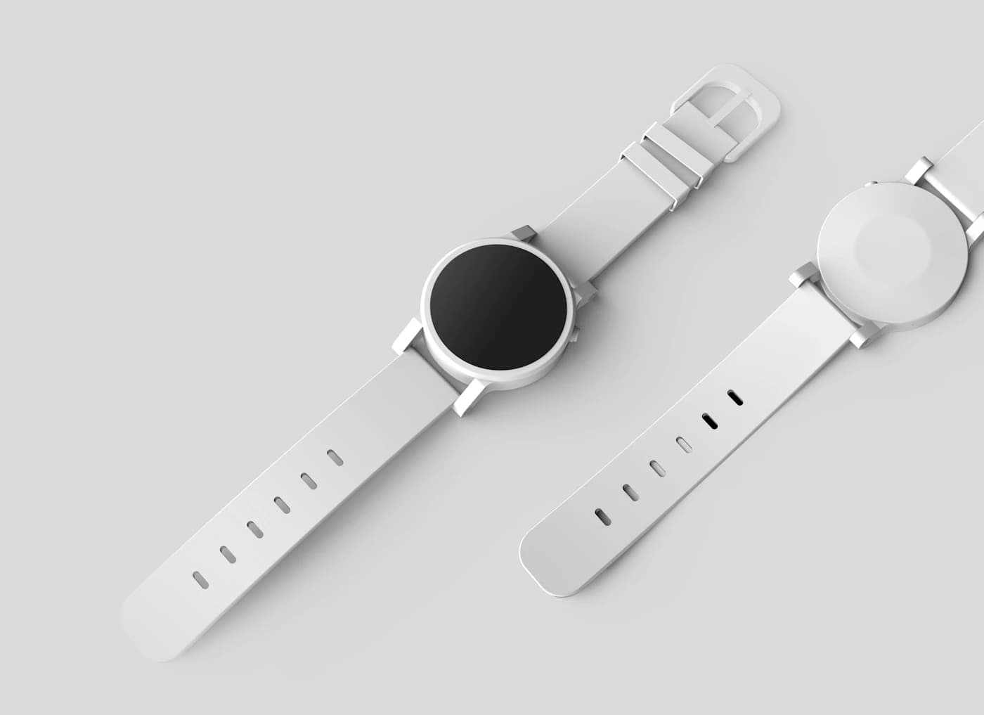 White wristwatch with a black face on a pale background, illustrative demo photograph